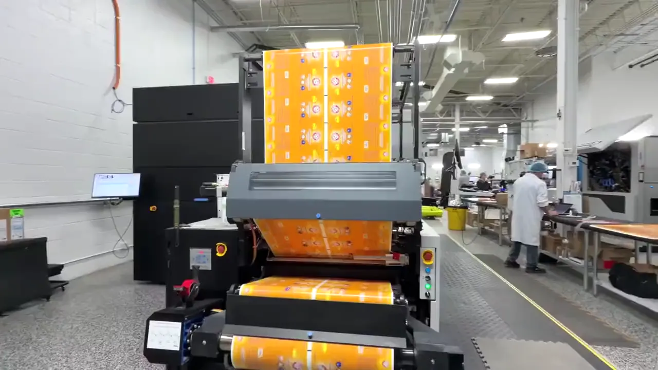 A press on the Brand My Bags floor in Oak Park printing pouch film