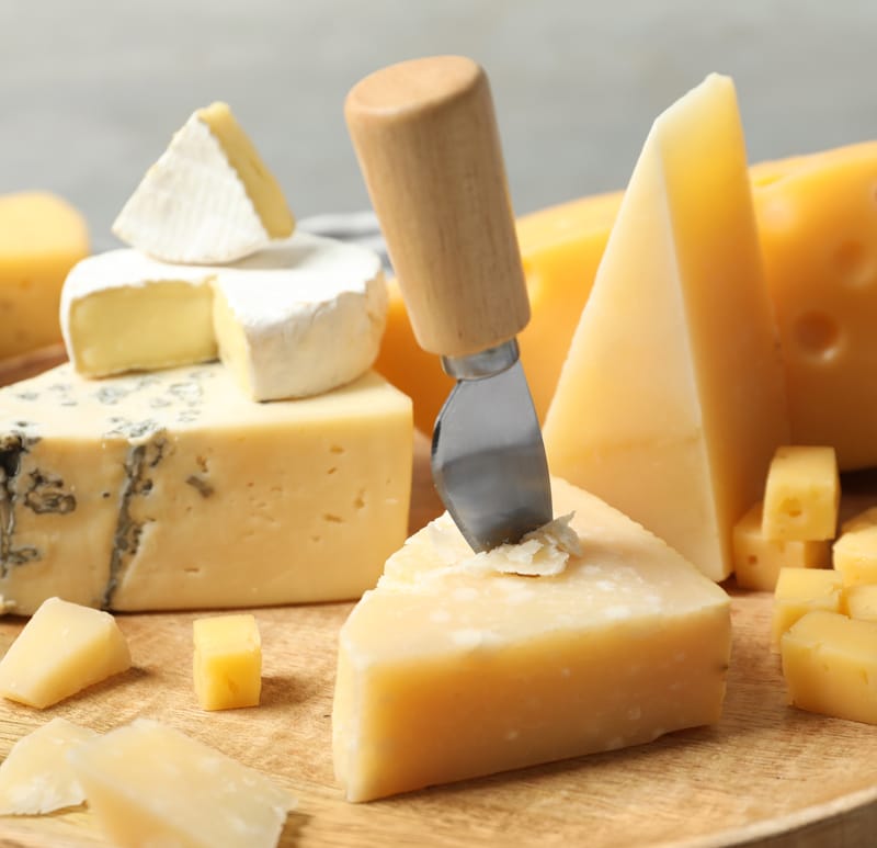 a piece of cake covered in cheese